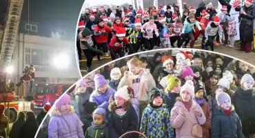 Mikołaj zjechał na linie ze strażackiego kosza! Garwolin pobił rekord choinkowego łańcucha!